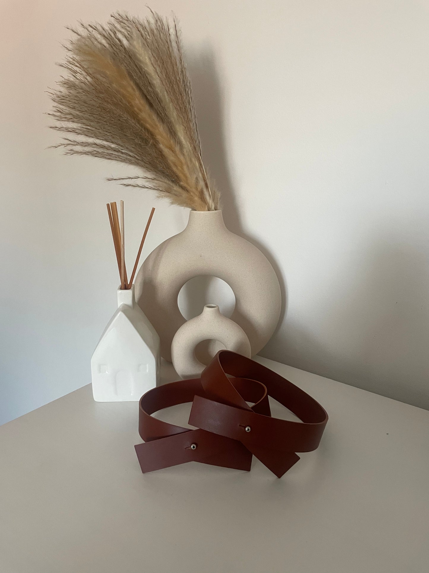 Criss cross leather curtain tie back Tan