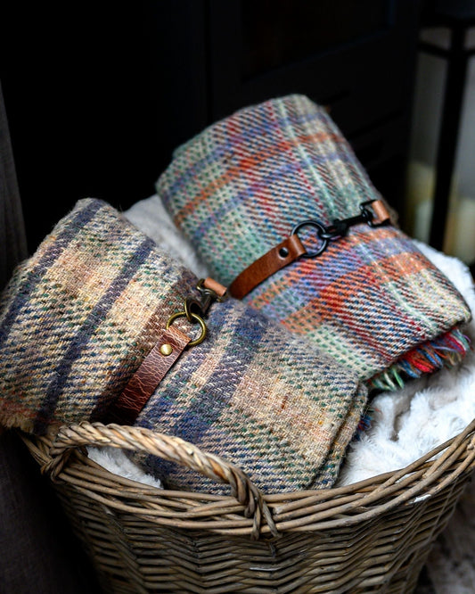 Handmade leather housewarming gifts including drawer pulls, curtain tie backs and napkin rings by Blue & Bell Home