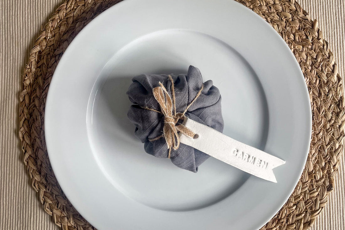 DIY Halloween pumpkin decoration made from orange napkin and leather napkin ring