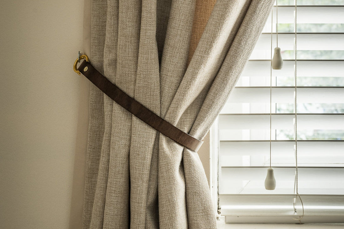 Handmade antique brown leather curtain tie back with brass hook