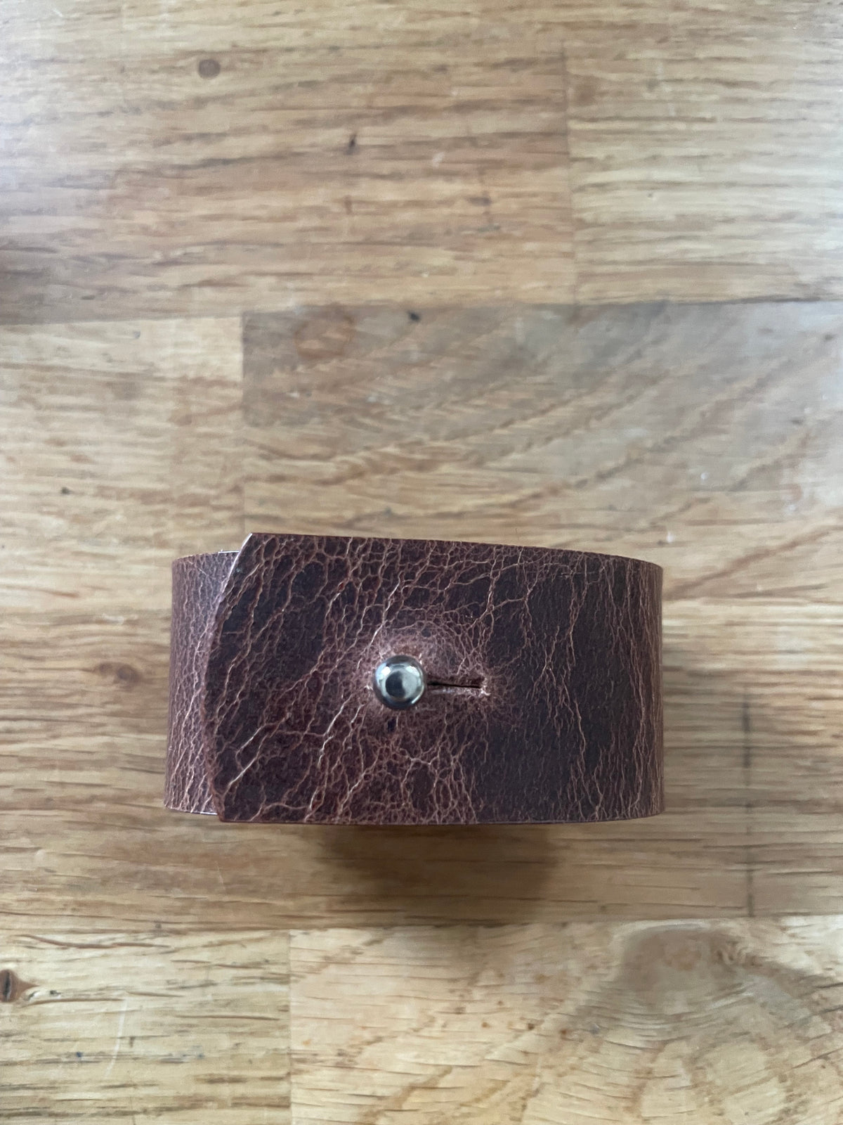 Antique brown leather napkin ring