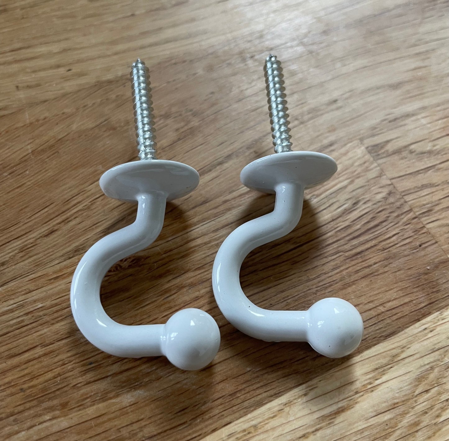 White curtain tie back hooks x 2